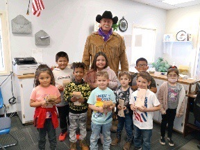 students with pony express riders
